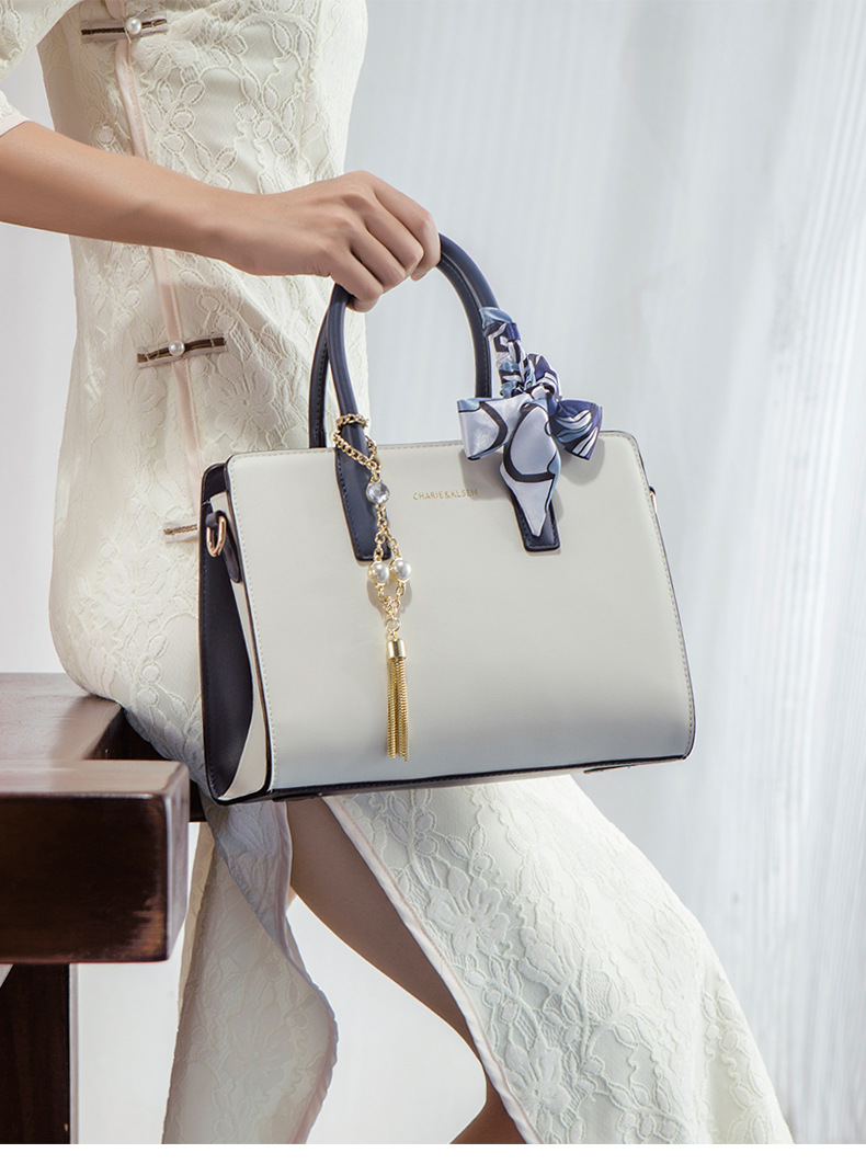 2025 New Faux Leather Satchel Handbag with Pearl Tassel Charm